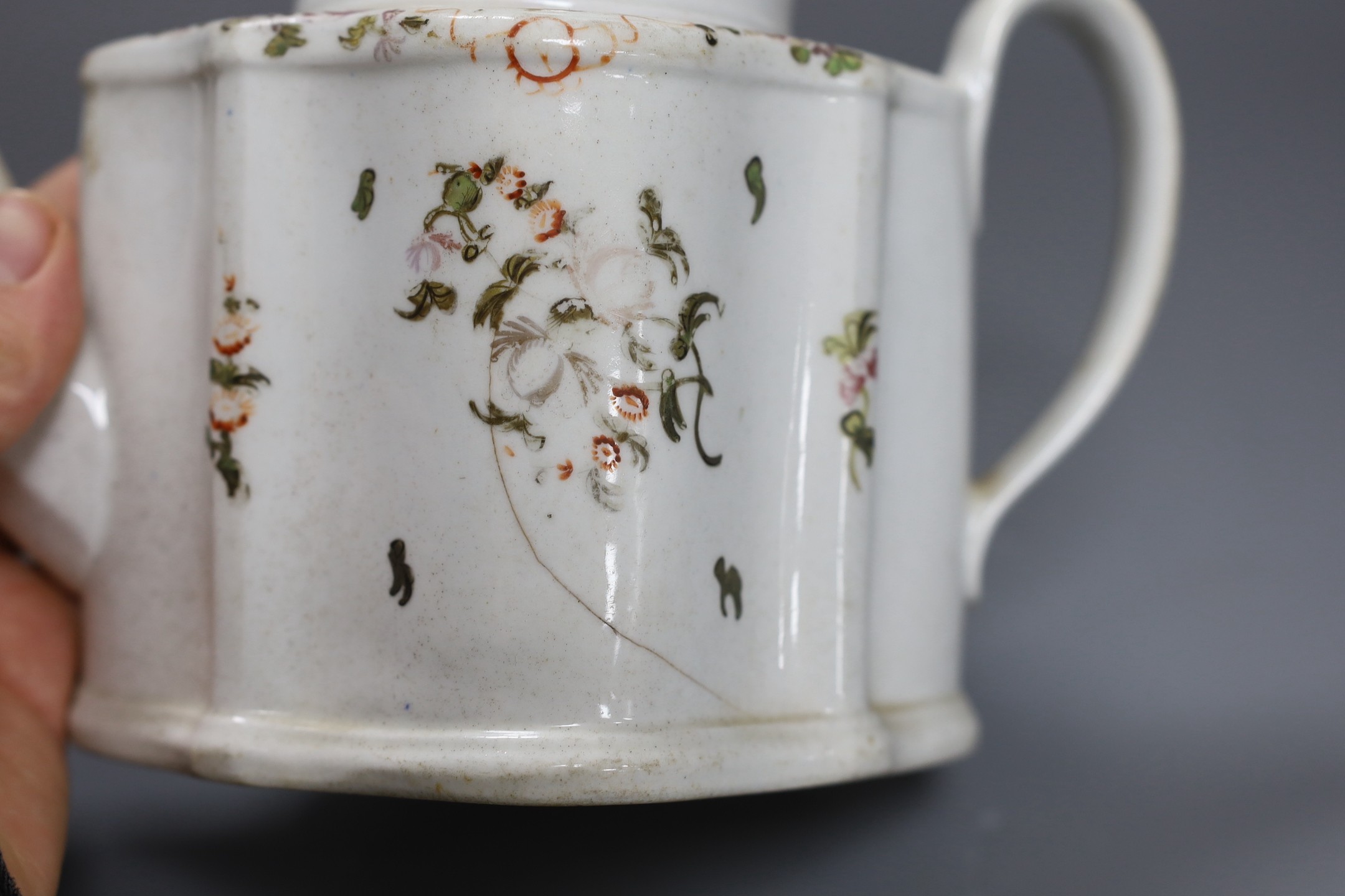 A New Hall type teapot and a similar tea bowl and saucer, teapot 15 cms high